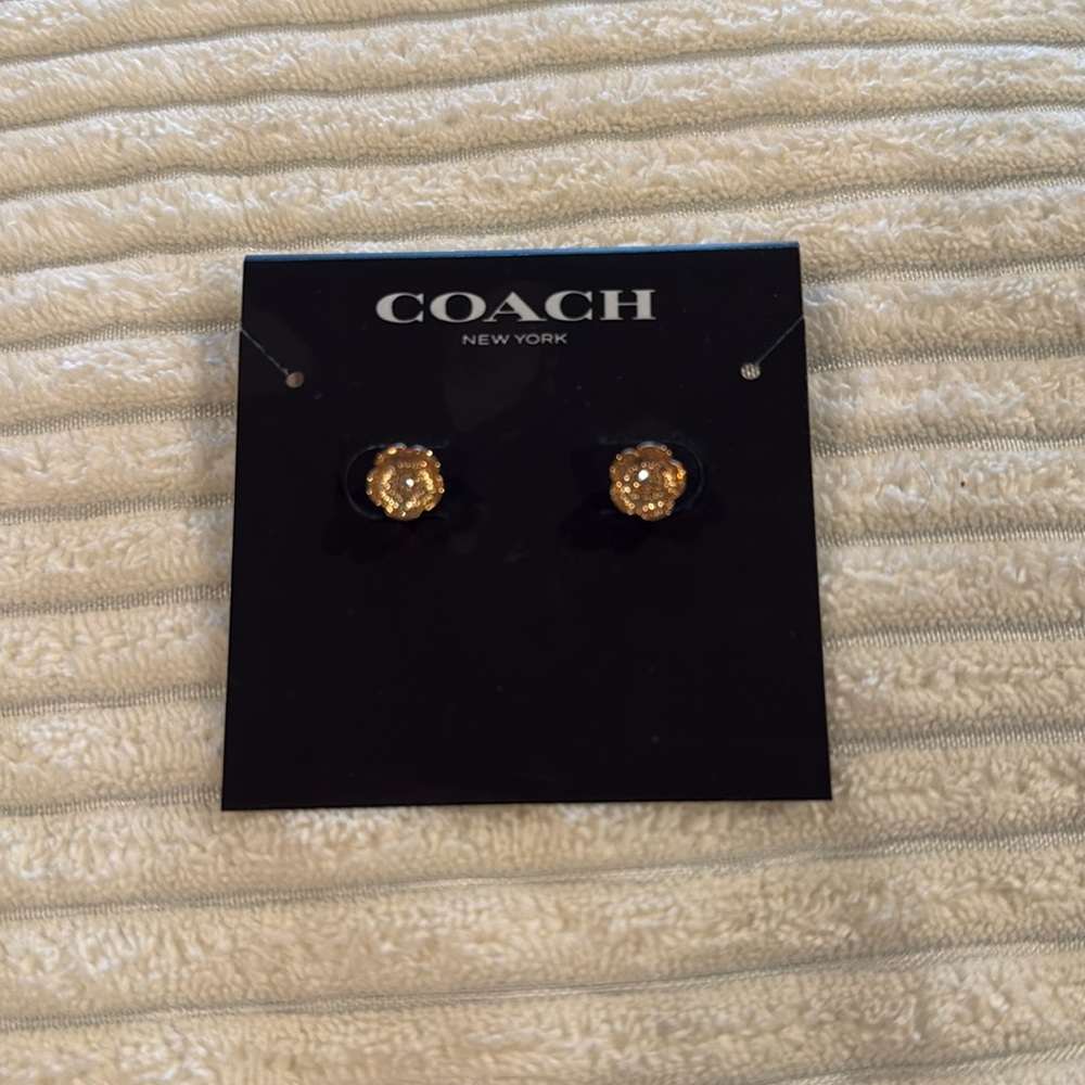 Coach floral earrings, rose gold color nwt